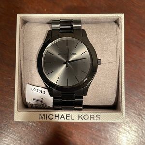 Michael Kors watch in perfect condition. Never worn and is still in box!